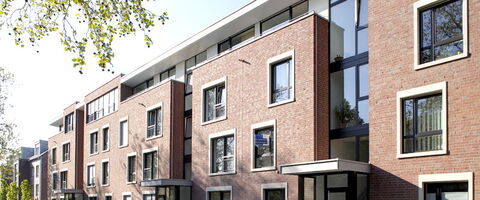 Neubau eines Mehrfamilienhauses mit 22 Wohneinheiten und 16 Doppelhaushälften in Düsseldorf Urdenbach